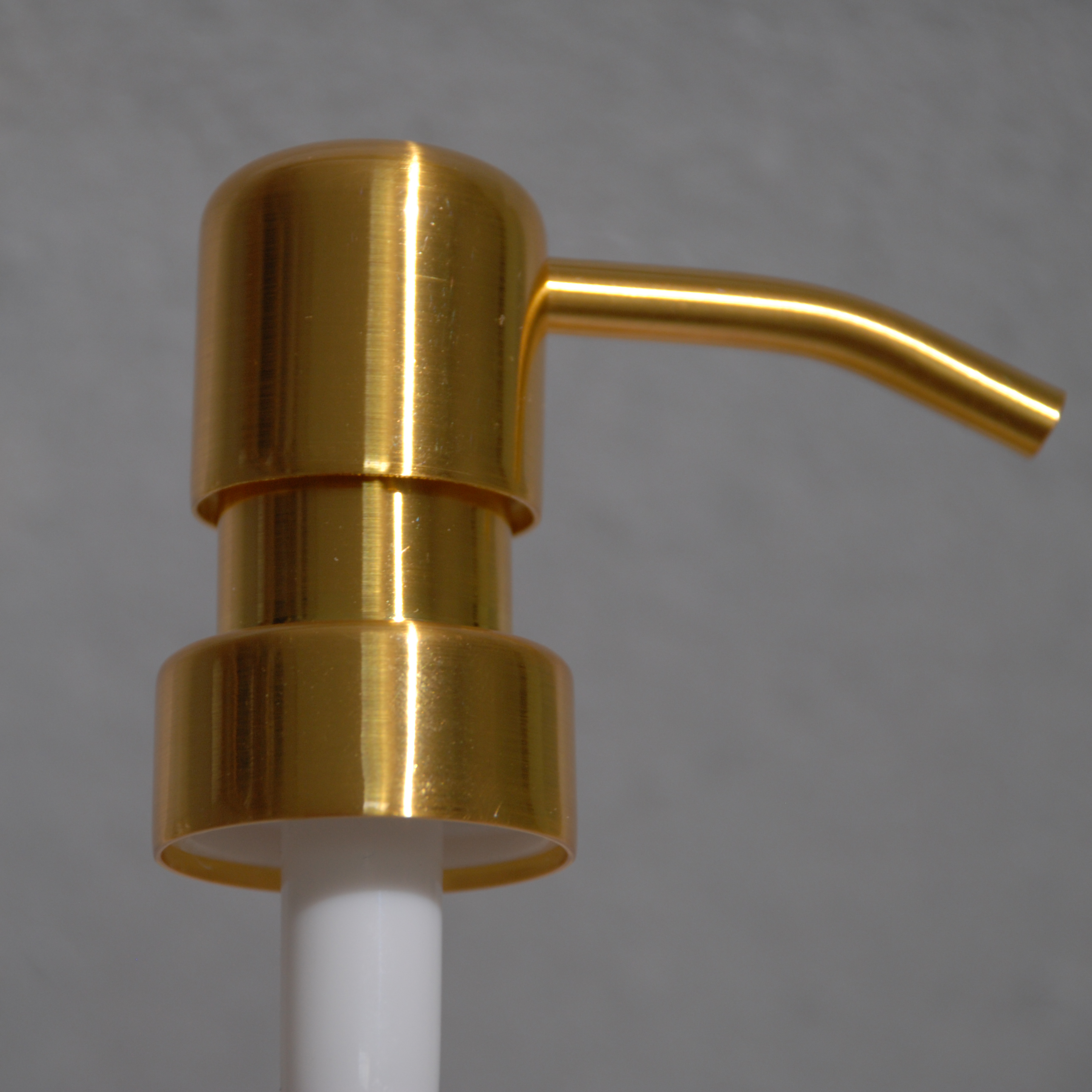 Brushed gold Soap/lotion Pump top with rounded head.