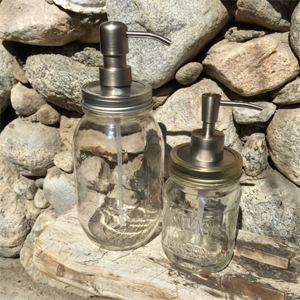Stainless steel adapters can be screwed down under regular mouth mason jars to create a mason jar soap pump.