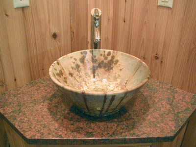  Another iron crystal round vessel sink,
installed