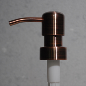Copper lotion Pump with rounded head.