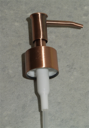 Copper lotion pump dispenser top.