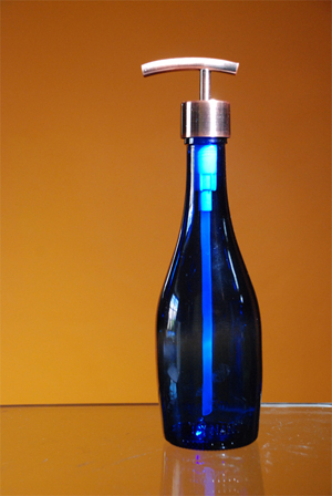 A cobalt blue spring water bottle
recycled into a soap pump