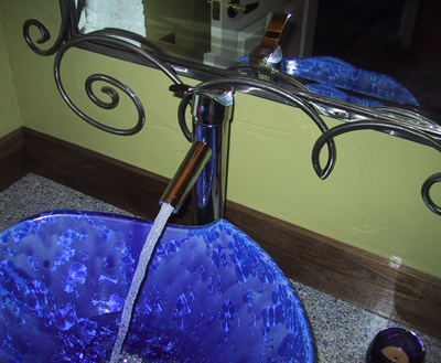 Cobalt blue custom wave vessel sink.